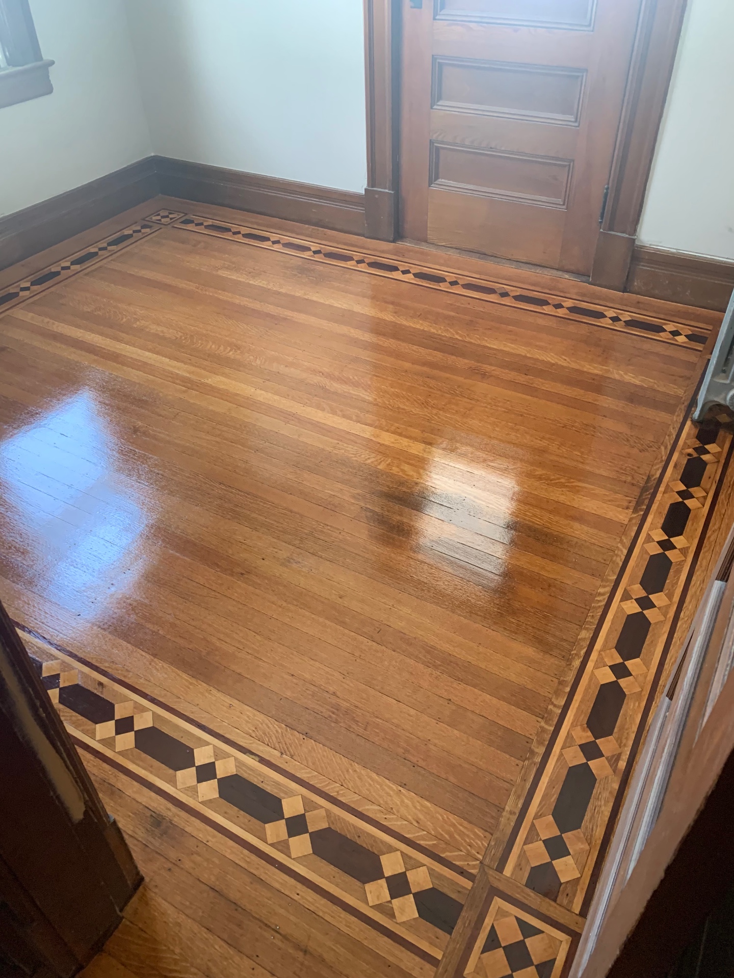 Dining room & border — after maintenance buff and re-coat