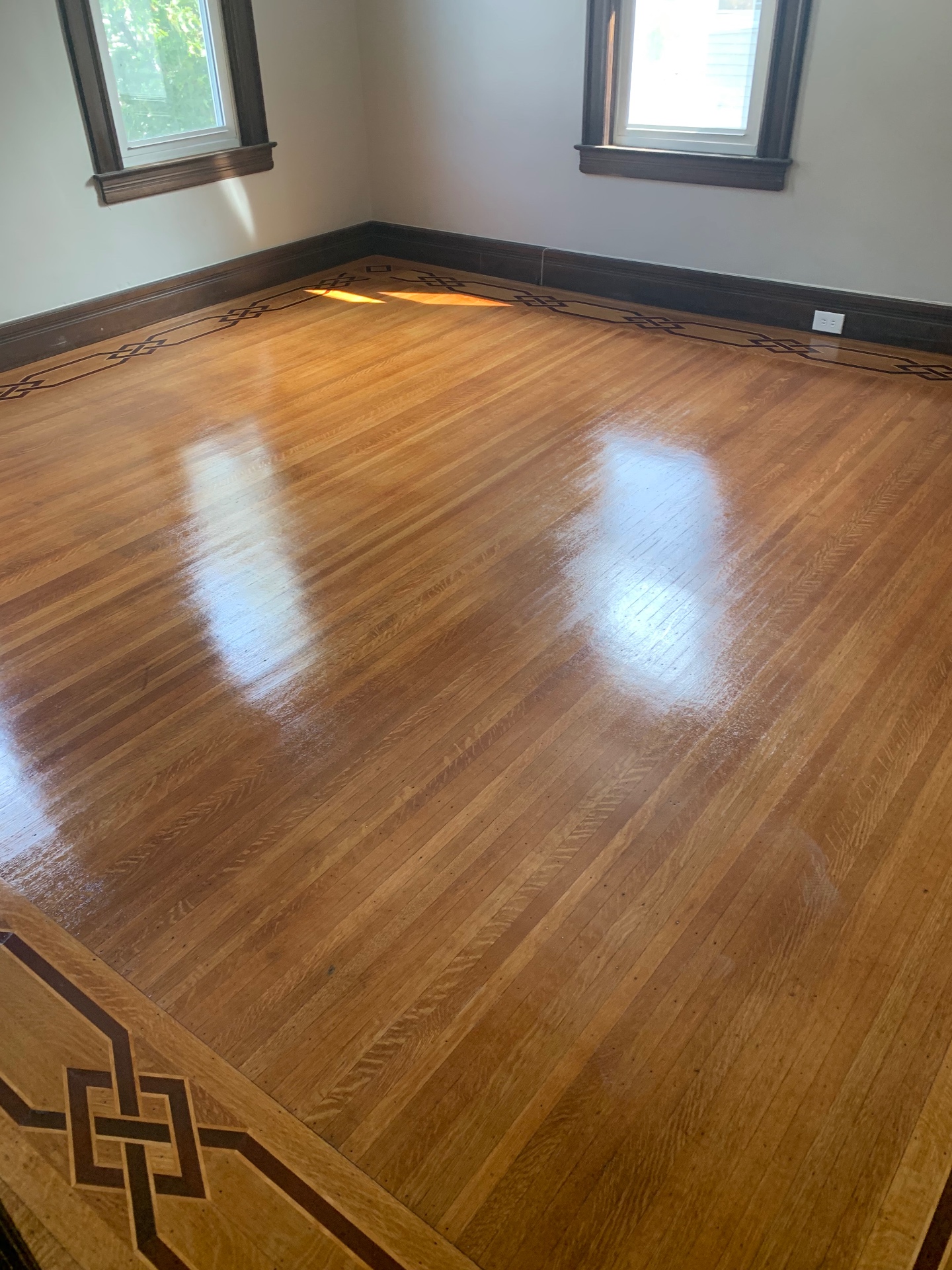 Quarter-sawn oak floor after a re-coat